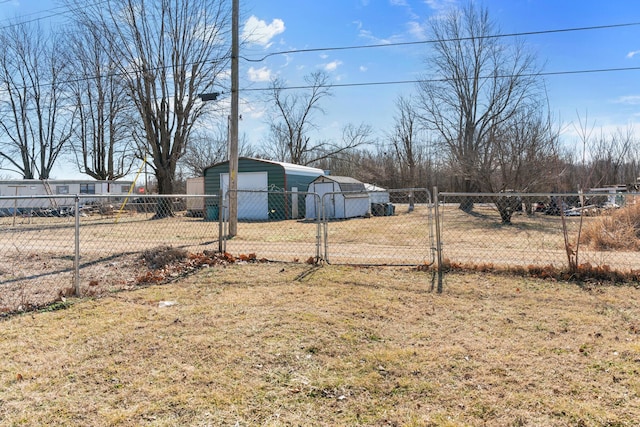 view of yard with a shed and a garage