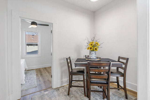 dining area with light wood-type flooring