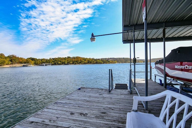 view of dock with a water view