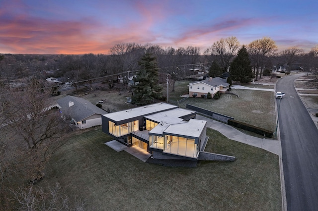 view of aerial view at dusk