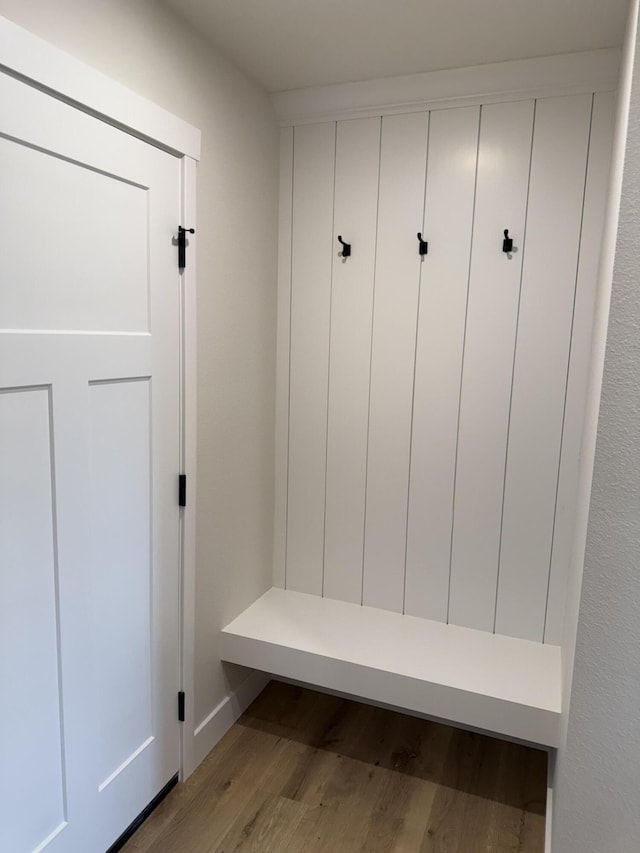 mudroom with light hardwood / wood-style flooring