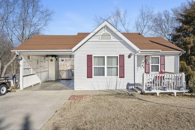 view of front of home with a carport