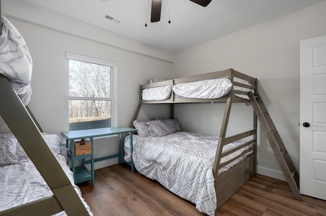 bedroom featuring dark wood-type flooring and ceiling fan