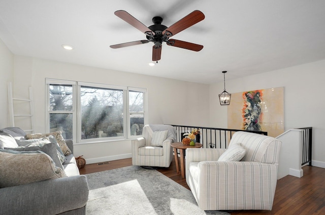 living room with dark hardwood / wood-style floors