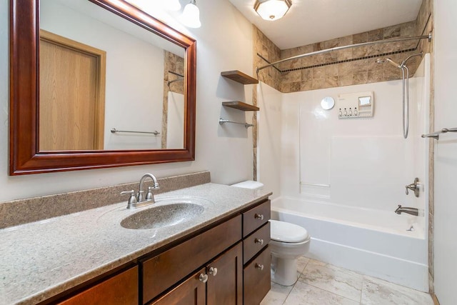 full bathroom with vanity, washtub / shower combination, and toilet