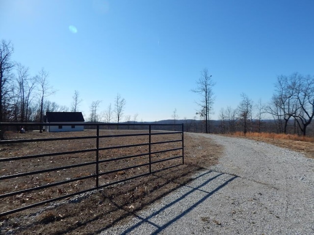 view of road featuring a rural view