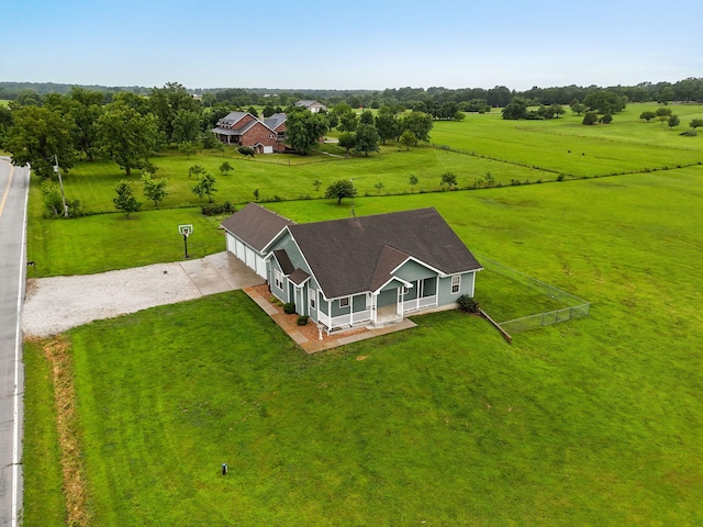 birds eye view of property featuring a rural view