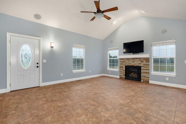 unfurnished living room featuring high vaulted ceiling, light tile patterned floors, a fireplace, and ceiling fan