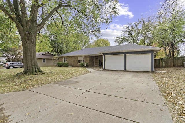 single story home with a garage