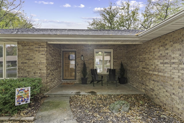 entrance to property featuring a patio area