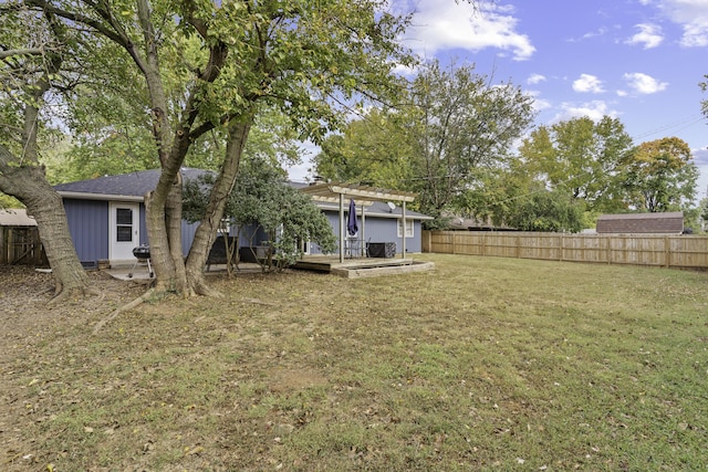 view of yard featuring a wooden deck