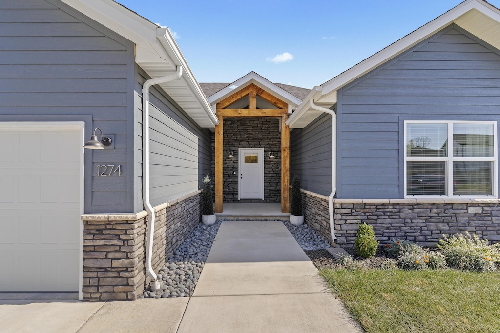 property entrance with a garage