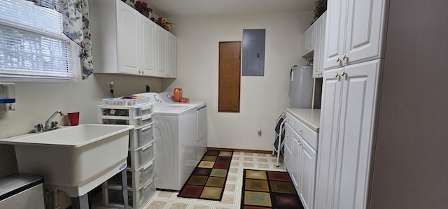 washroom featuring sink, electric panel, electric water heater, cabinets, and separate washer and dryer