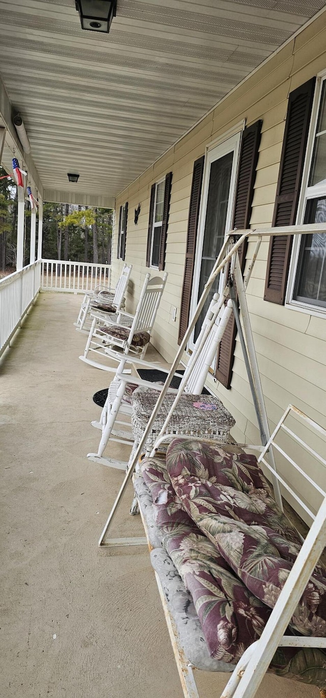 view of patio featuring a porch