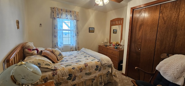 bedroom featuring ceiling fan, carpet floors, and a closet