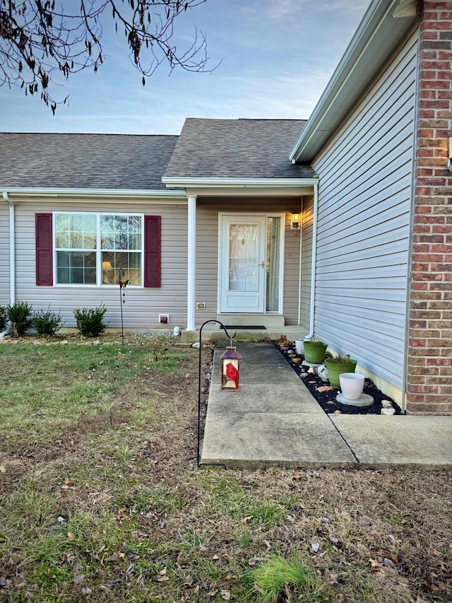 doorway to property with a patio