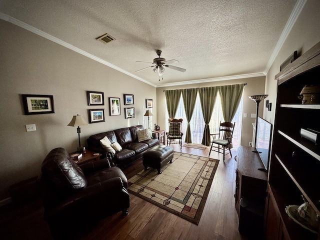 living room featuring lofted ceiling, crown molding, ceiling fan, wood-type flooring, and a textured ceiling