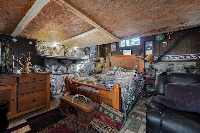 bedroom with wooden walls