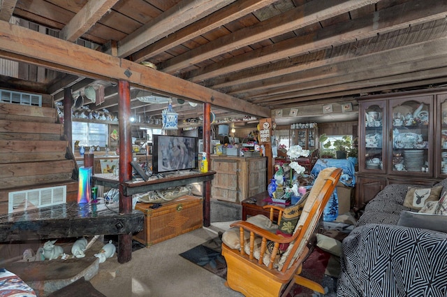 misc room featuring carpet floors and wooden ceiling