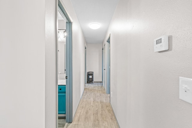 hallway featuring light wood-type flooring