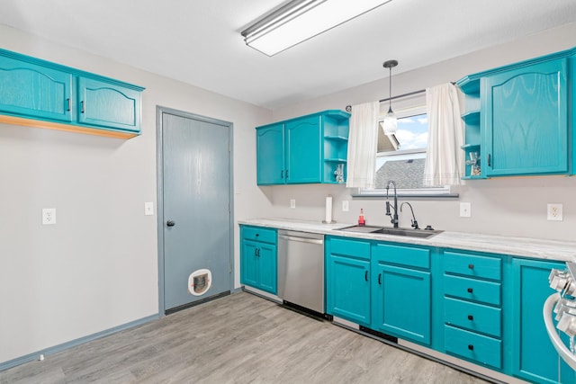 kitchen featuring blue cabinets, sink, hanging light fixtures, dishwasher, and light hardwood / wood-style floors