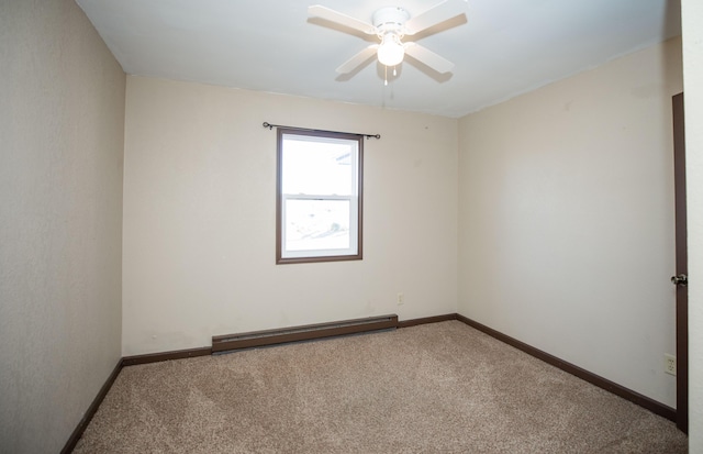 carpeted spare room with ceiling fan and baseboard heating