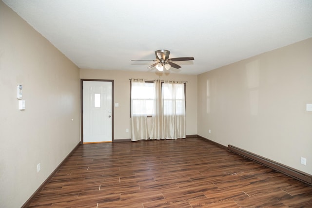 empty room featuring ceiling fan, a baseboard radiator, and dark hardwood / wood-style floors