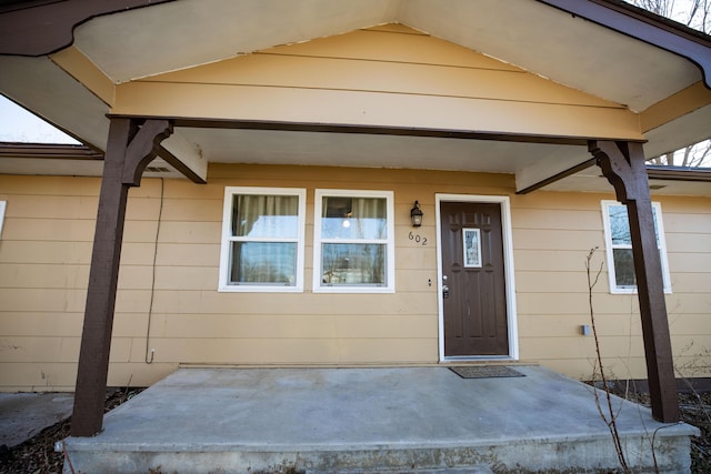 property entrance with a patio area