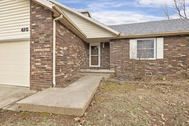 property entrance featuring a garage