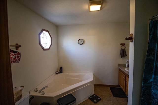 bathroom featuring vanity and a bathing tub