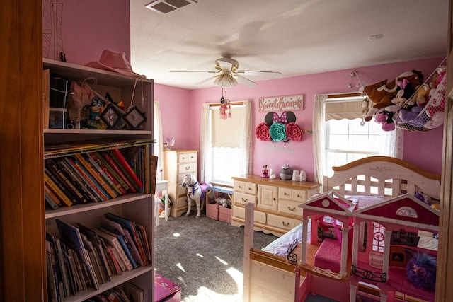 bedroom featuring ceiling fan and carpet flooring