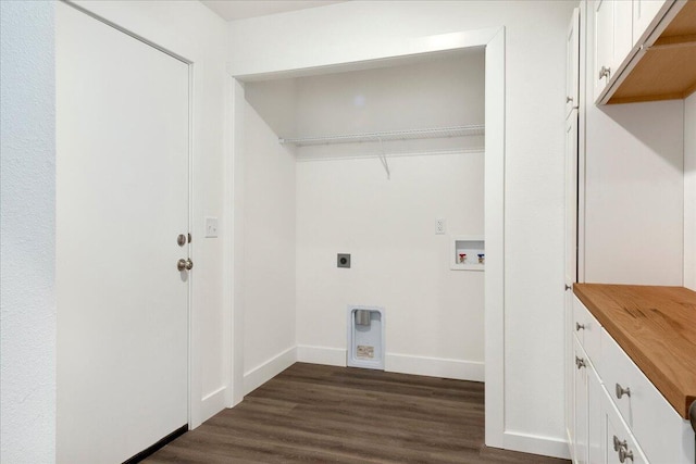 washroom with washer hookup, dark hardwood / wood-style floors, and hookup for an electric dryer