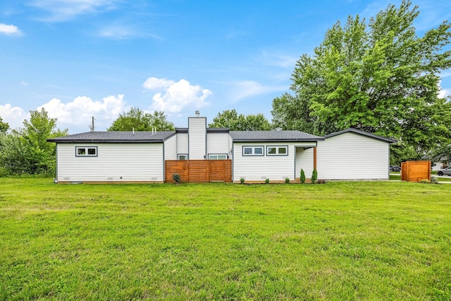 3481 W Moark St, Springfield, MO 65810 - rear view of house featuring a chimney and crawl space