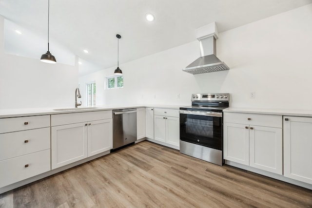 3481 W Moark St, Springfield, MO 65810 - kitchen with stainless steel appliances, ventilation hood, light wood finished floors, light countertops, and pendant lighting