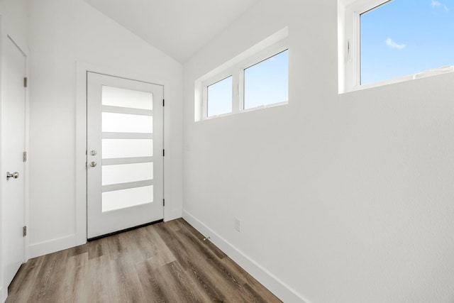 3481 W Moark St, Springfield, MO 65810 - doorway featuring wood finished floors and vaulted ceiling