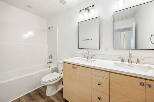 3481 W Moark St, Springfield, MO 65810 - bathroom with wood finished floors, double vanity, and bathtub / shower combination