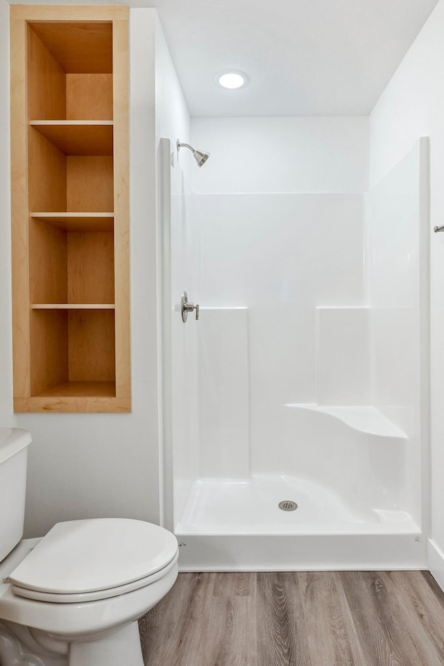 3481 W Moark St, Springfield, MO 65810 - bathroom featuring wood finished floors and a shower