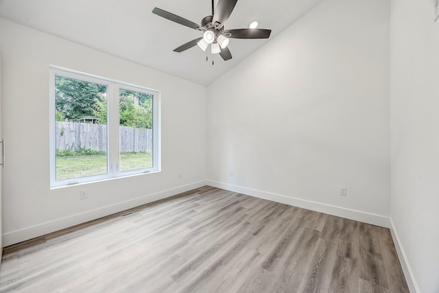 3481 W Moark St, Springfield, MO 65810 - unfurnished room featuring vaulted ceiling, light wood-type flooring, and ceiling fan
