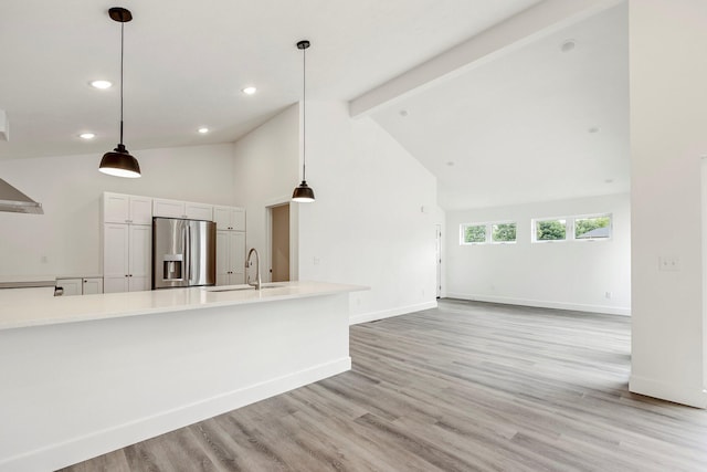 3481 W Moark St, Springfield, MO 65810 - unfurnished living room with light wood-style floors, recessed lighting, beamed ceiling, and high vaulted ceiling