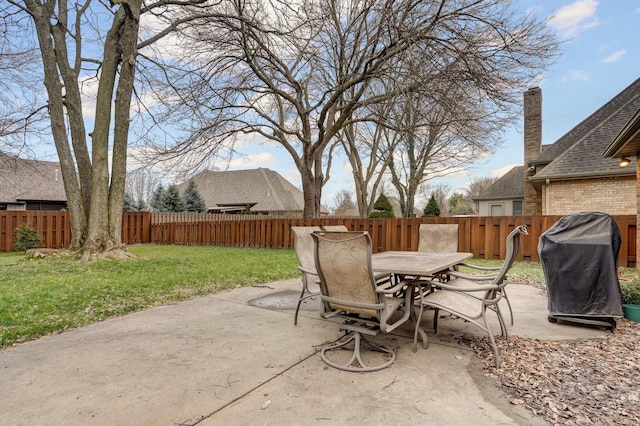 view of patio featuring a grill