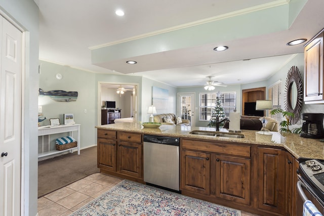 kitchen featuring sink, crown molding, stainless steel appliances, light stone counters, and light tile patterned flooring