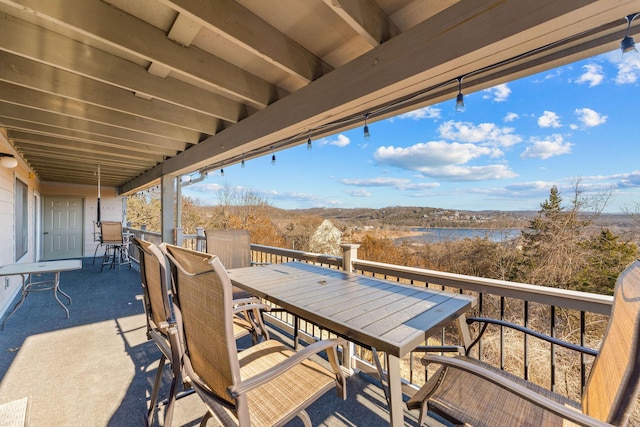 view of patio featuring a water view