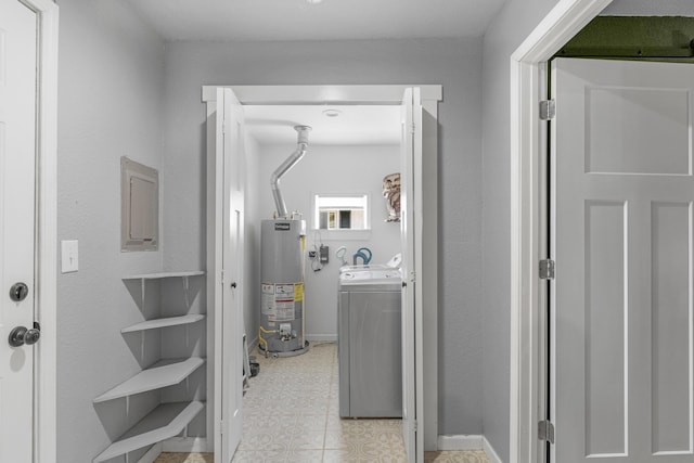 corridor with independent washer and dryer and water heater