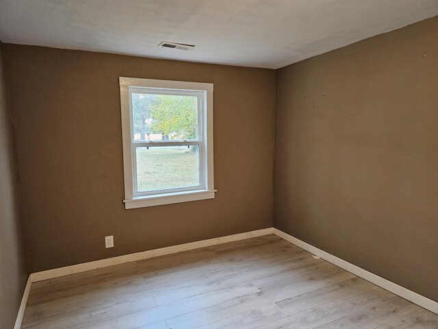 1101 E 18th St, Lamar, MO 64759 - empty room featuring light hardwood / wood-style flooring