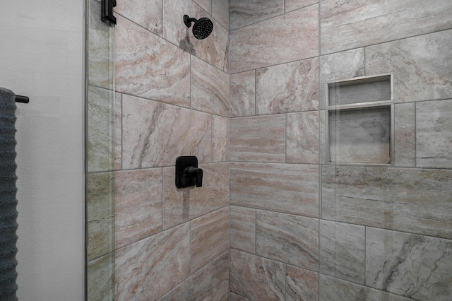 details featuring a tile shower