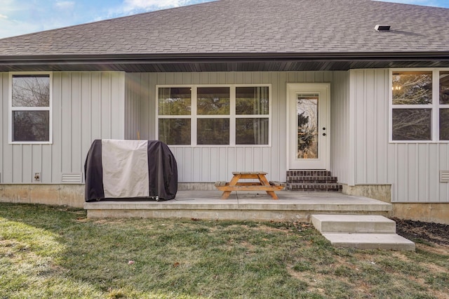 property entrance featuring a yard