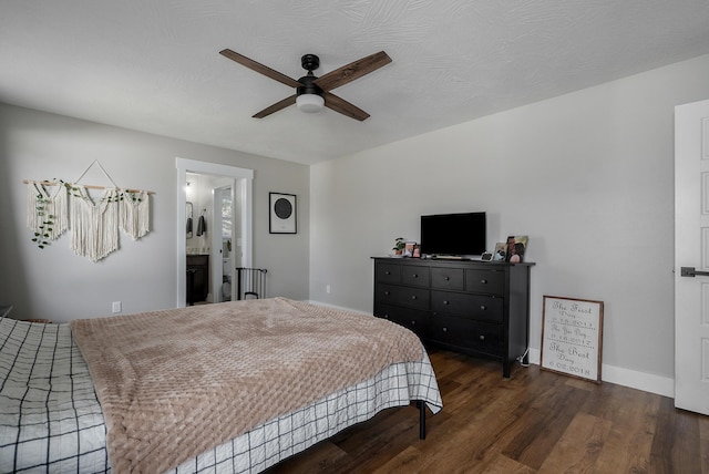 bedroom with dark hardwood / wood-style flooring, ceiling fan, and ensuite bathroom