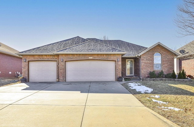 single story home featuring a garage