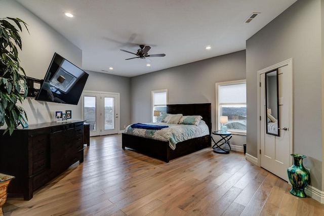 bedroom featuring ceiling fan, access to exterior, and light wood-type flooring