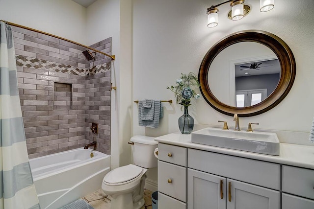 full bathroom featuring vanity, shower / bath combination with curtain, and toilet